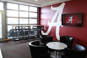 five baseballs sitting on a wooden bench